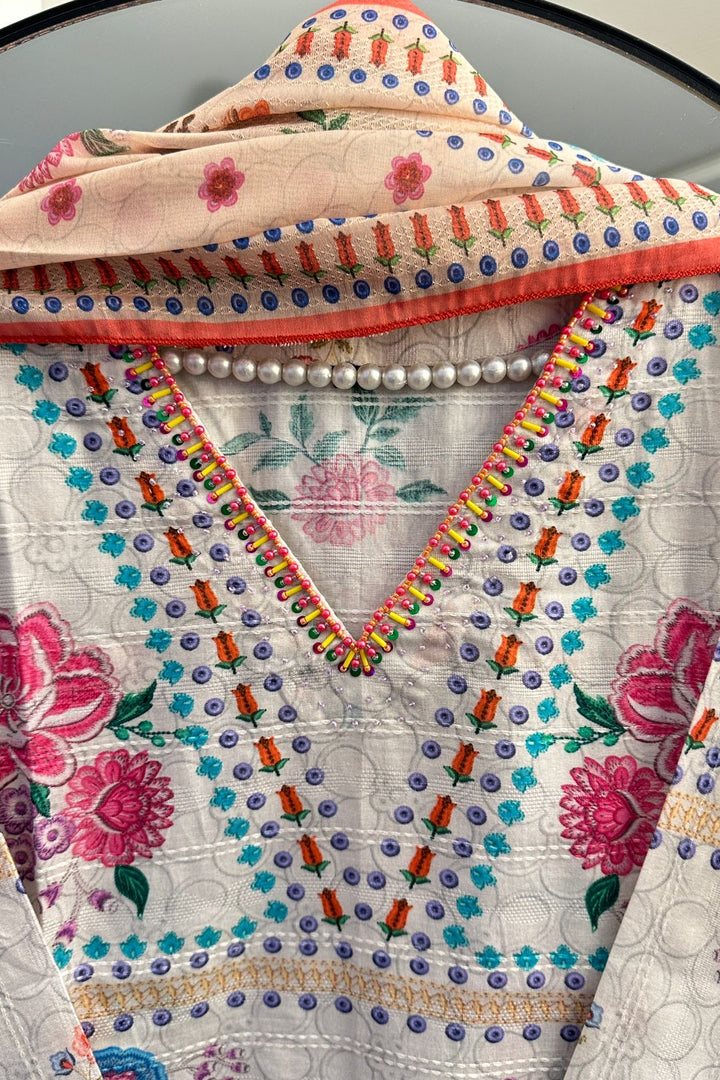 Floral Elegance V-Neck Handwork Lawn – 3 Piece Suit